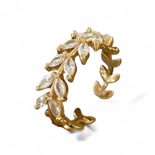 AUKSINĖS SPALVOS LAPŲ ŽIEDAS SU SKAIDRIAIS CIRKONIAIS